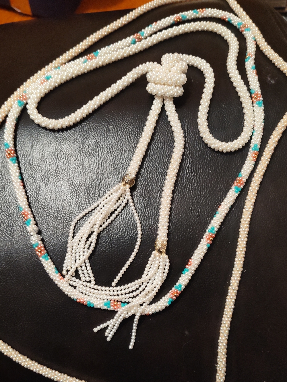 Elegant White Beaded Lariat Necklace with Turquoise & Rose Accents